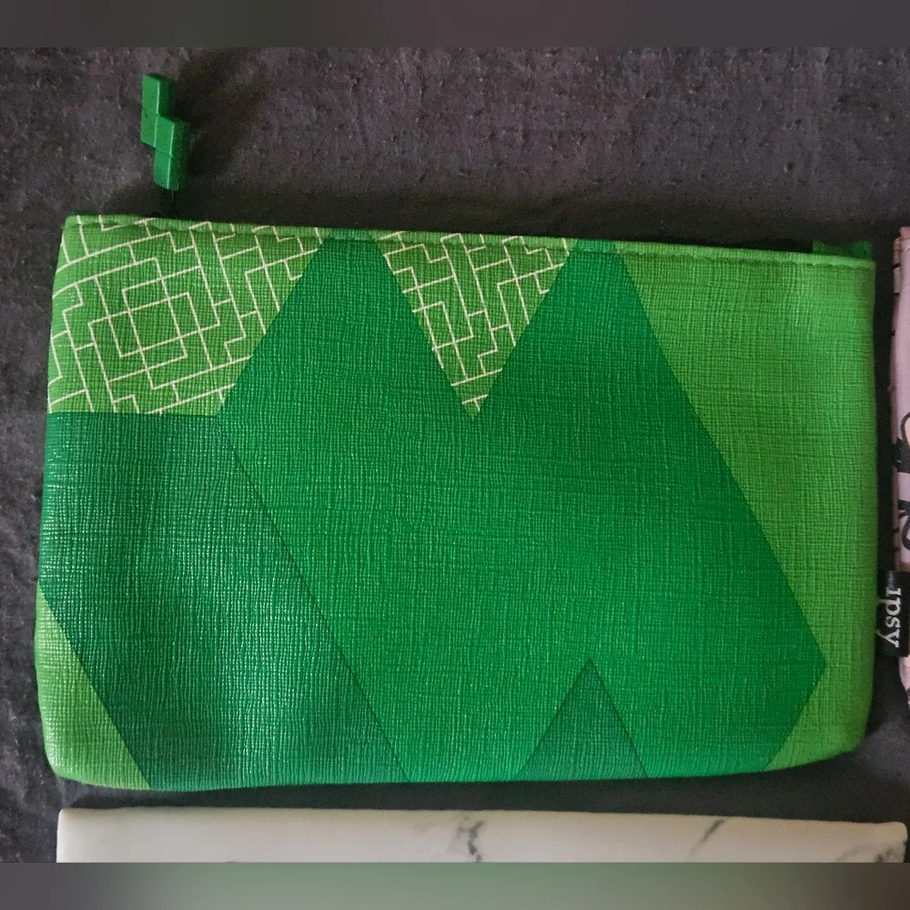 4 ipsy makeup/travel bags